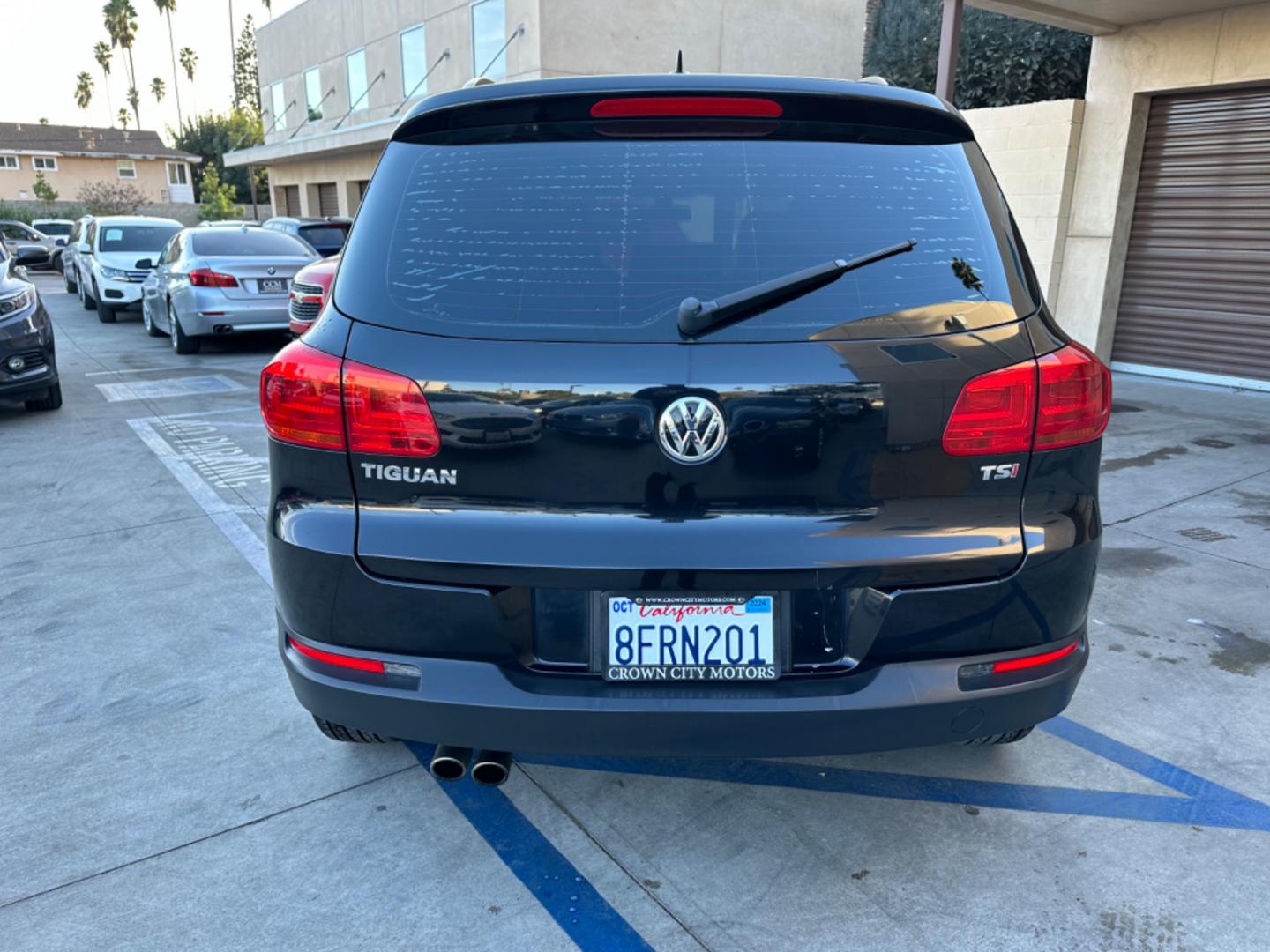 2016 Black /Black Volkswagen Tiguan (WVGAV7AX5GW) , AUTOMATIC transmission, located at 30 S. Berkeley Avenue, Pasadena, CA, 91107, (626) 248-7567, 34.145447, -118.109398 - Crown City Motors is a used “Buy Here Pay Here” car dealer in Pasadena CA. “Buy Here Pay Here” financing, means that when you purchase your vehicle from our dealership, that you make the payments to the dealership as well. We do not need the banks approval to get you approved for a used auto - Photo#4